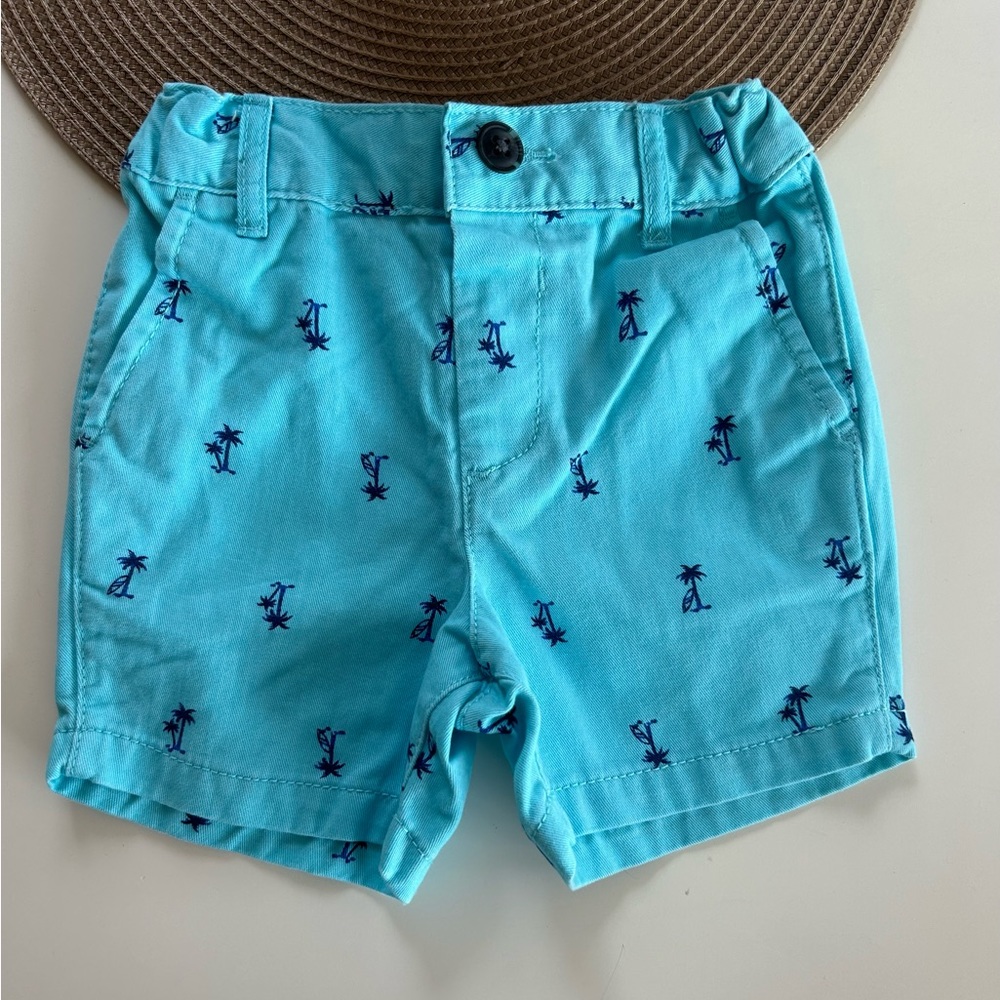 Aqua with navy blue palm tree shorts